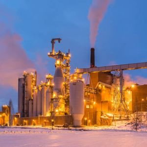 Stacked steel inventory in warehouse – assorted metal sheets and beams