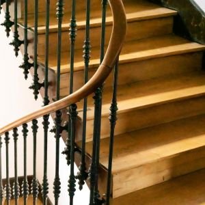 Industrial steel warehouse with stacked metal sheets and beams